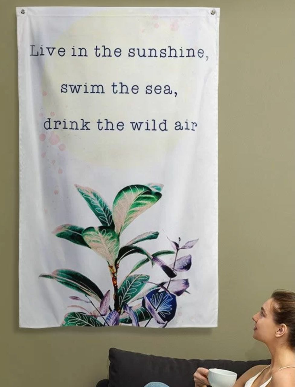 a woman looking at a banner